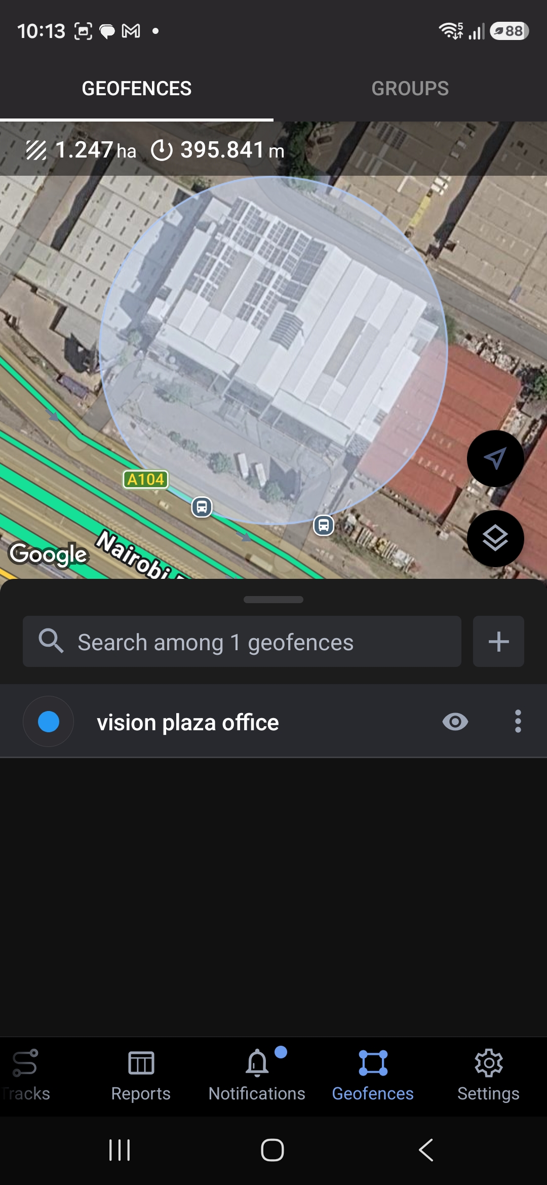 A circular geofence marked around Vision Plaza office in the tracking app