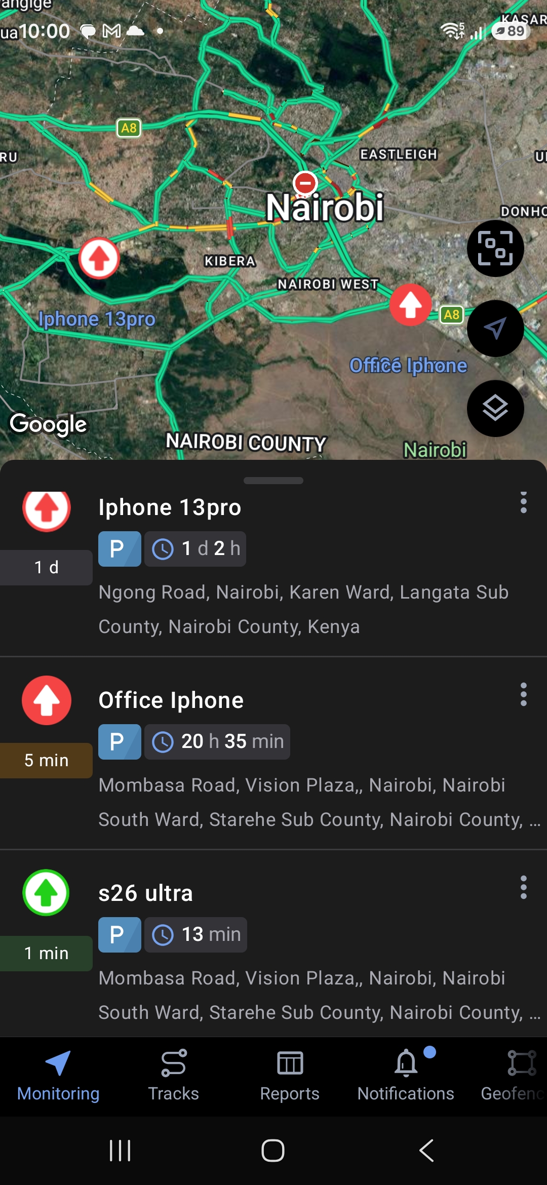 Finatrack tracking account showing three connected phones on a Nairobi map